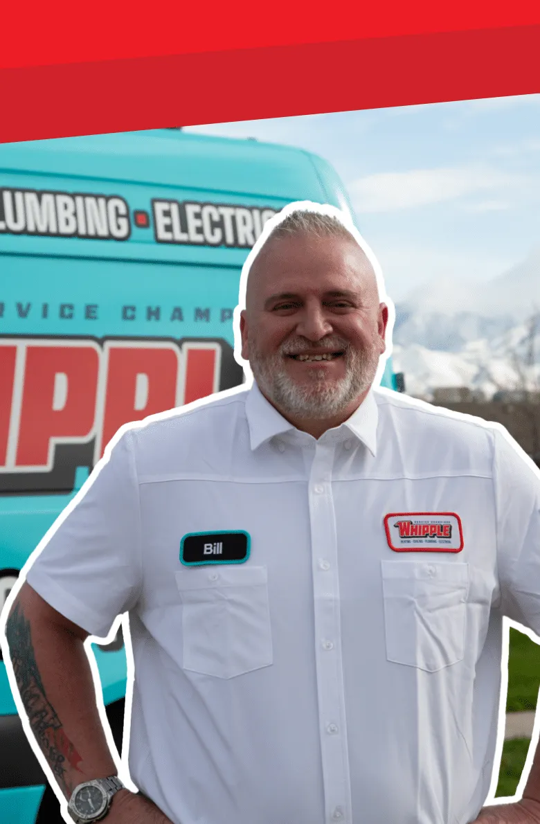 Whipple Service Champions technician with branded service van